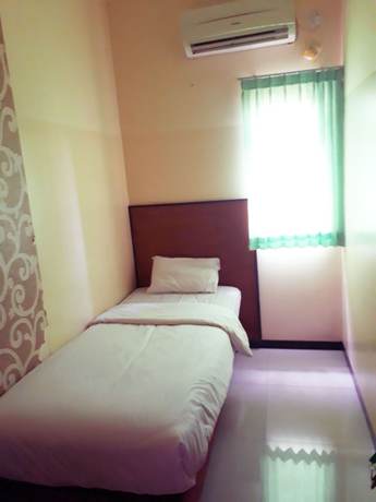 Imagen de la habitación del Hotel Pelangi Indah. Foto 10