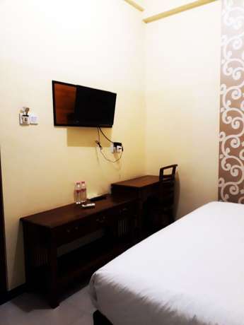 Imagen de la habitación del Hotel Pelangi Indah. Foto 11