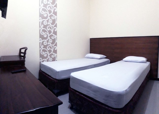 Imagen de la habitación del Hotel Pelangi Indah. Foto 13