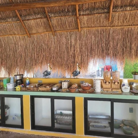 Imagen del bar/restaurante del Hotel Pelican Inn at Las Dunas Resort. Foto 5
