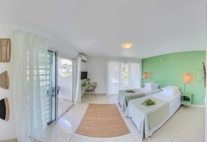 Imagen de la habitación del Hotel Pelican, L'Enclos. Foto 12