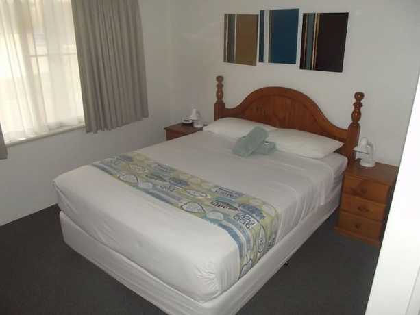 Imagen de la habitación del Hotel Pelican Shore Villas. Foto 10