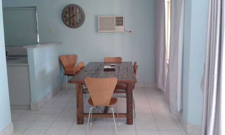 Imagen de la habitación del Hotel Pelican Shore Villas. Foto 12