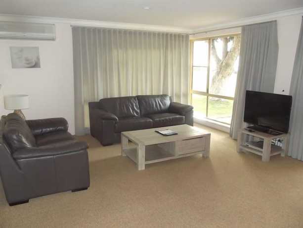 Imagen de la habitación del Hotel Pelican Shore Villas. Foto 13