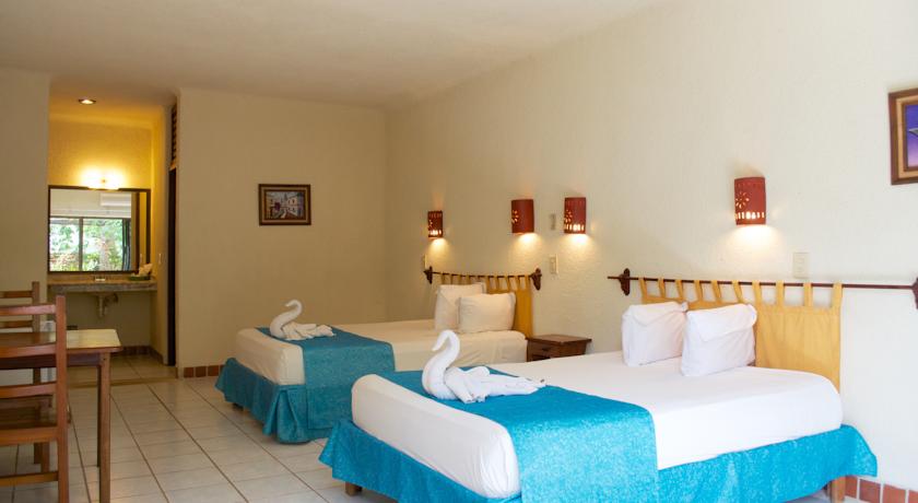 Imagen de la habitación del Hotel Pelicano Inn Playa Del Carmen - Beachfront. Foto 3