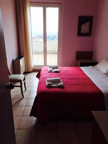 Imagen de la habitación del Hotel Pellegrino E Pace. Foto 2