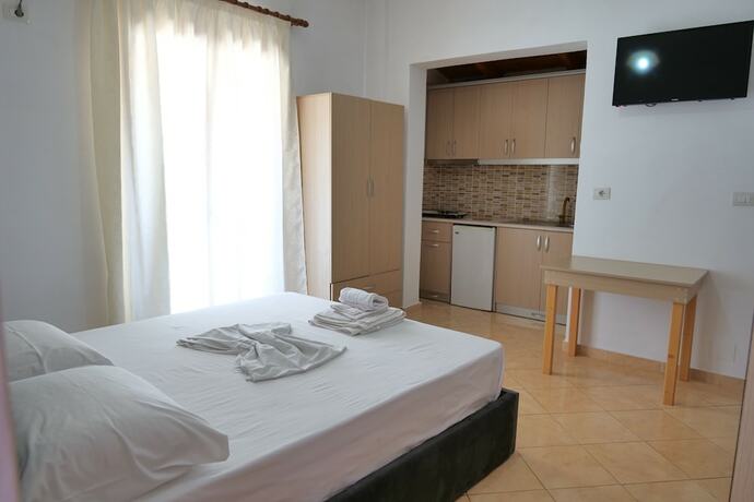 Imagen de la habitación del Hotel Pellumb Apartments. Foto 13
