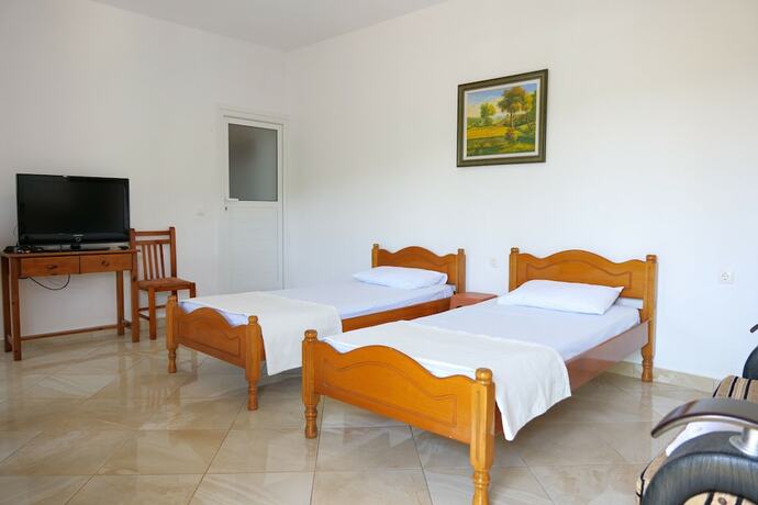 Imagen de la habitación del Hotel Pellumb Apartments. Foto 14