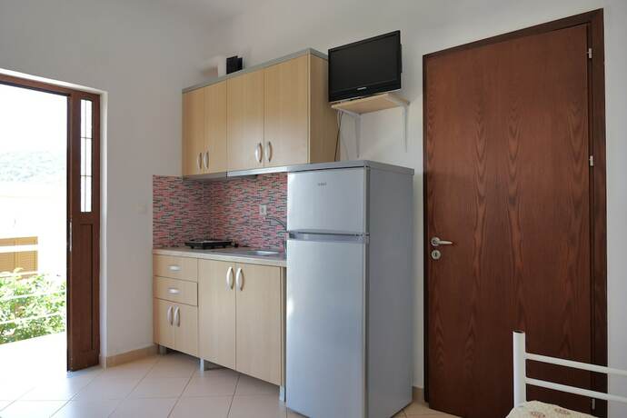 Imagen de la habitación del Hotel Pellumb Apartments. Foto 16
