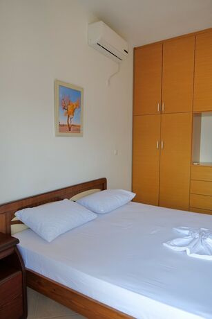 Imagen de la habitación del Hotel Pellumb Apartments. Foto 18