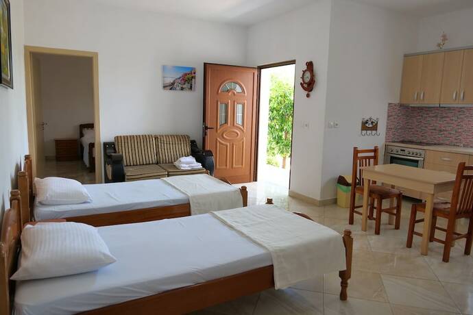 Imagen de la habitación del Hotel Pellumb Apartments. Foto 20