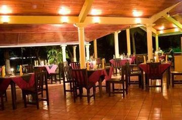 Imagen del bar/restaurante del Hotel Pelwehera Village Resort. Foto 3