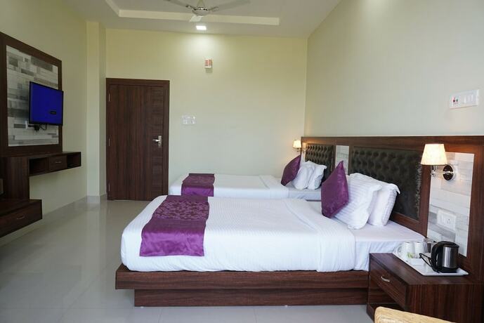 Imagen de la habitación del Hotel Pemaling Lords Eco Inn Guwahati, Guwahati. Foto 18
