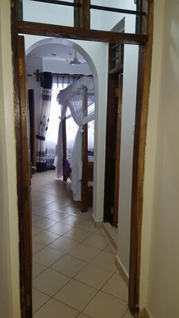 Imagen de la habitación del Hotel Pendo Villas Diani. Foto 19