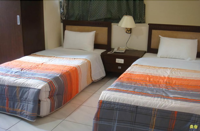 Imagen de la habitación del Hotel Penghu Farmers Association Resort. Foto 17