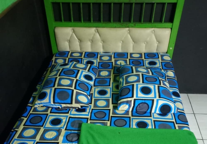 Imagen de la habitación del Hotel Penginapan 99. Foto 3