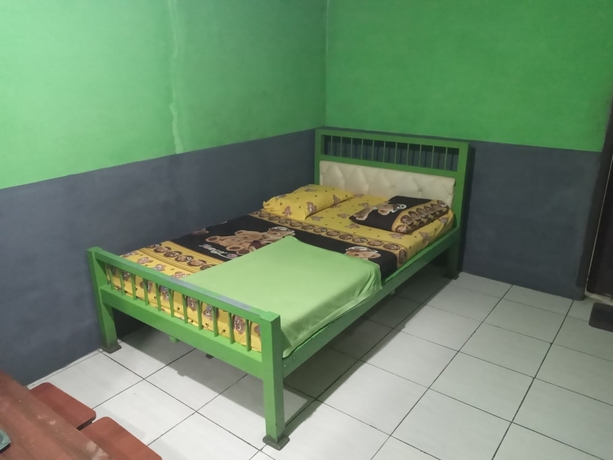 Imagen de la habitación del Hotel Penginapan 99. Foto 4