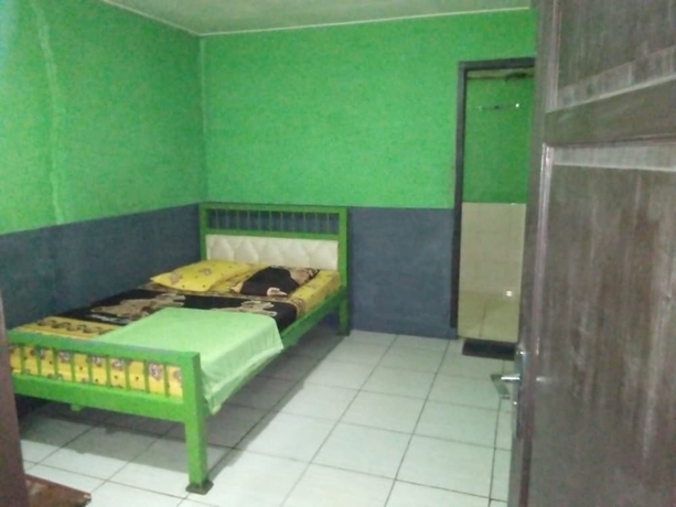Imagen de la habitación del Hotel Penginapan 99. Foto 5