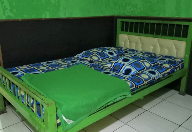 Imagen de la habitación del Hotel Penginapan 99. Foto 6