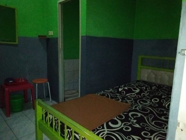 Imagen de la habitación del Hotel Penginapan 99. Foto 7