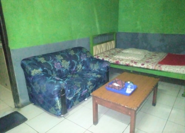 Imagen de la habitación del Hotel Penginapan 99. Foto 8