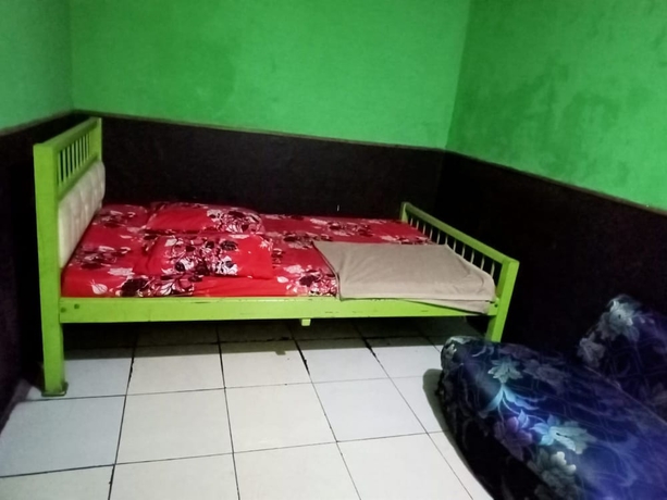Imagen de la habitación del Hotel Penginapan 99. Foto 9