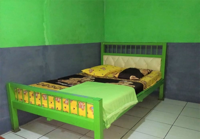 Imagen de la habitación del Hotel Penginapan 99. Foto 10