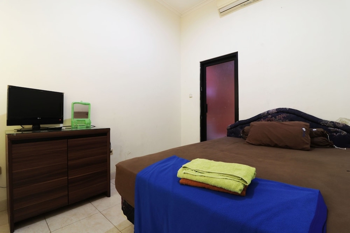 Imagen de la habitación del Hotel Penginapan Marsya Prima Syariah. Foto 2