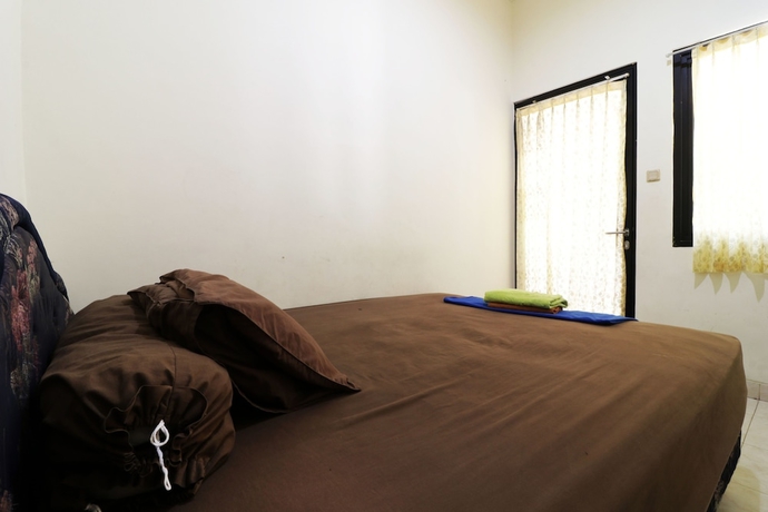 Imagen de la habitación del Hotel Penginapan Marsya Prima Syariah. Foto 3