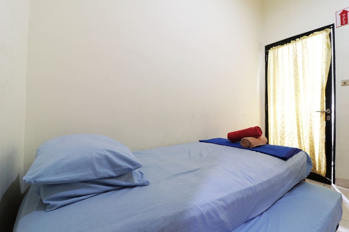 Imagen de la habitación del Hotel Penginapan Marsya Prima Syariah. Foto 6