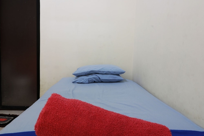Imagen de la habitación del Hotel Penginapan Marsya Prima Syariah. Foto 7