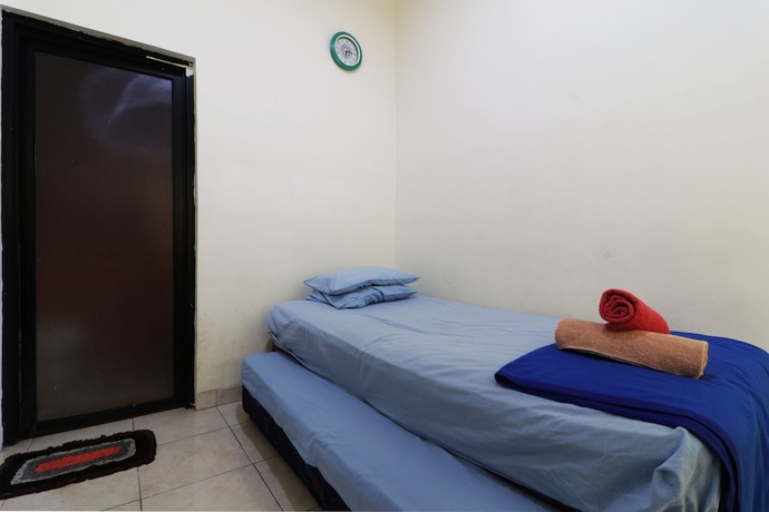 Imagen de la habitación del Hotel Penginapan Marsya Prima Syariah. Foto 8