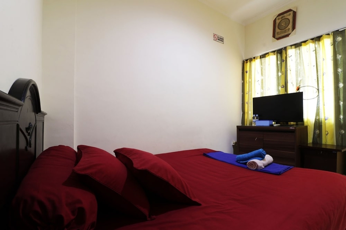 Imagen de la habitación del Hotel Penginapan Marsya Prima Syariah. Foto 10