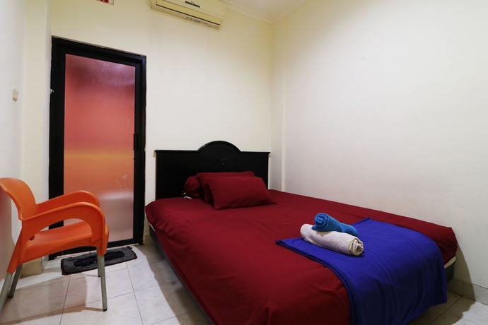 Imagen de la habitación del Hotel Penginapan Marsya Prima Syariah. Foto 11