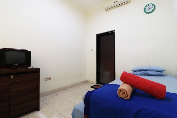 Imagen de la habitación del Hotel Penginapan Marsya Prima Syariah. Foto 13