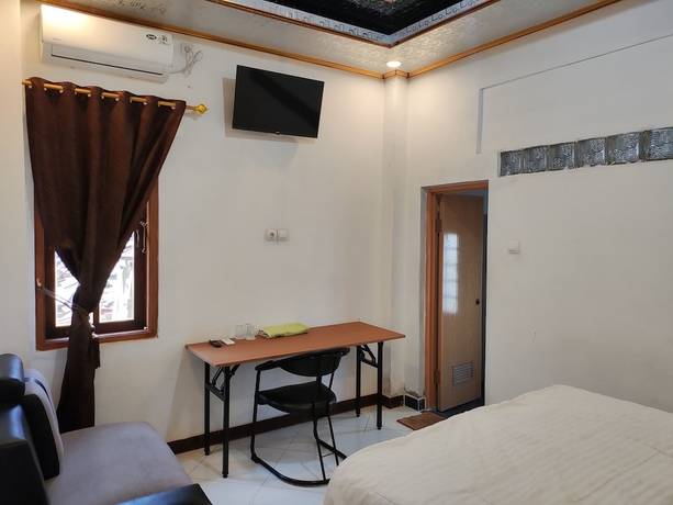 Imagen de la habitación del Hotel Penginapan Nurmega jaya. Foto 6
