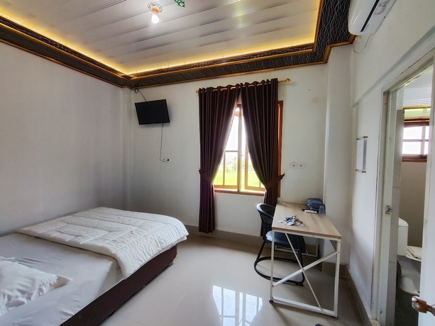 Imagen de la habitación del Hotel Penginapan Nurmega jaya. Foto 9