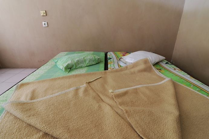 Imagen de la habitación del Hotel Penginapan Rodeo. Foto 6