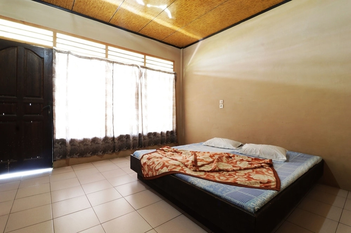 Imagen de la habitación del Hotel Penginapan Rodeo. Foto 7