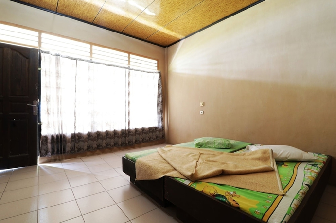 Imagen de la habitación del Hotel Penginapan Rodeo. Foto 13