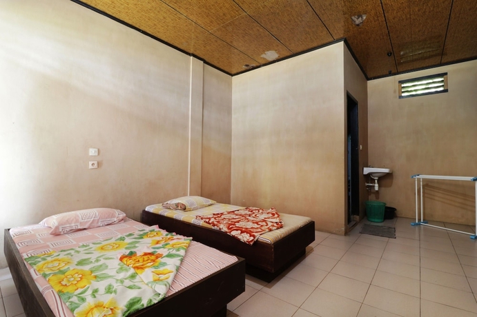 Imagen de la habitación del Hotel Penginapan Rodeo. Foto 19