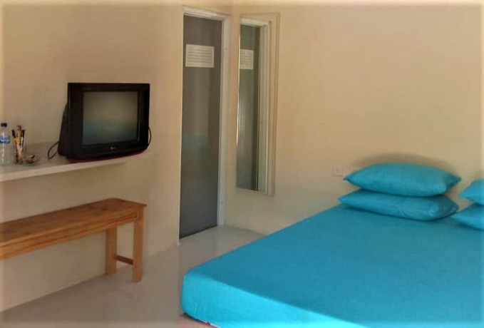 Imagen de la habitación del Hotel Penginapan Rudi. Foto 16