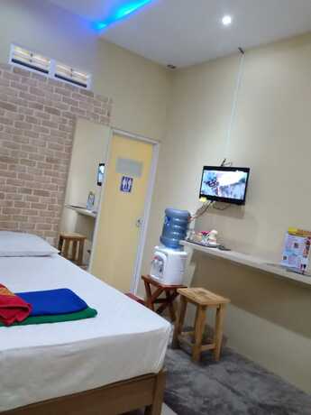 Imagen de la habitación del Hotel Penginapan Rudi. Foto 17