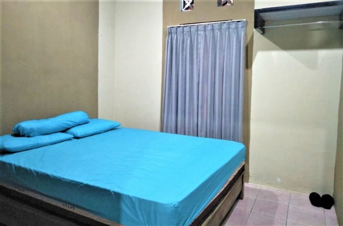 Imagen de la habitación del Hotel Penginapan Rudi. Foto 19