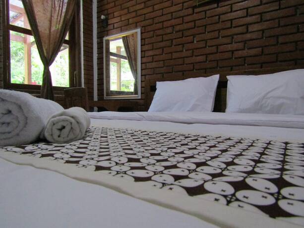 Imagen de la habitación del Hotel Penginapan Udin Syariah Bukit Rhema. Foto 20