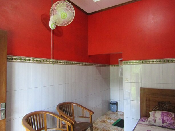 Imagen de la habitación del Hotel Penginapan Vionna. Foto 7