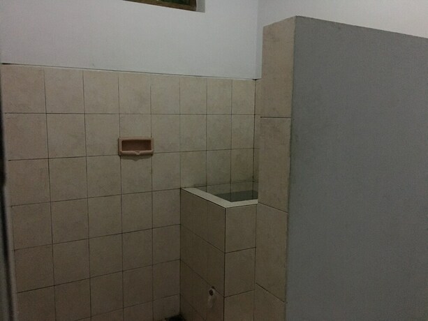 Imagen de la habitación del Hotel Penginapan Vionna. Foto 8