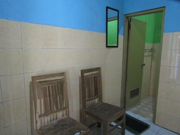 Imagen de la habitación del Hotel Penginapan Vionna. Foto 11