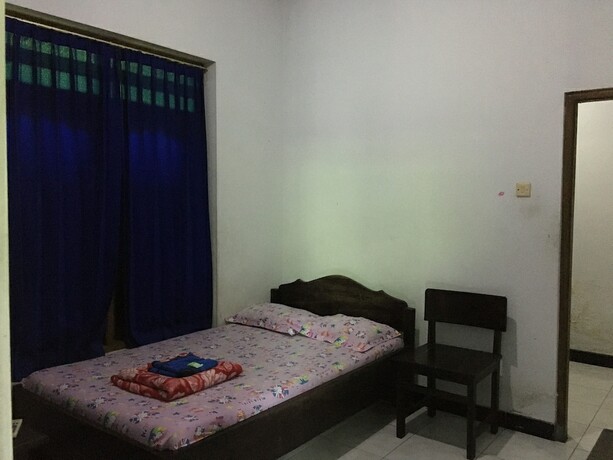 Imagen de la habitación del Hotel Penginapan Vionna. Foto 12