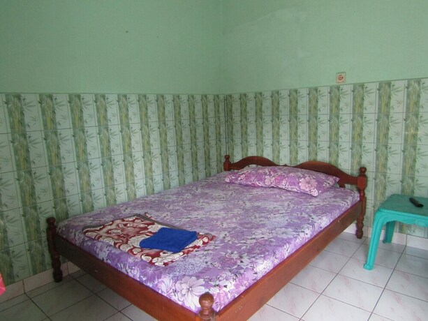 Imagen de la habitación del Hotel Penginapan Vionna. Foto 13